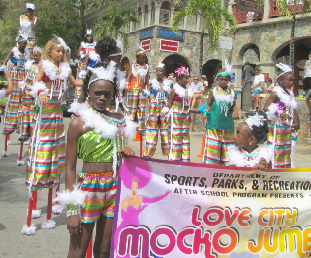 Love City Mocko Jumbies take part in the St. John Festival Parade.