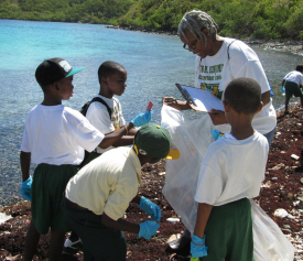 Third grade teacher Brenda Brown with her students at Haulover Bay. Third grade teacher Brenda Brown with her students at Haulover Bay.
