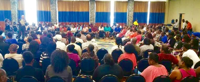 A packed house hangs on the words of keyote speaker Andres Lara at the fifth annual Parent Conference Sunday at the Marriott Frenchman's Reef Hotel.