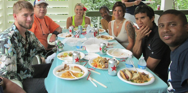 Team River Runner members sit down to lunch.