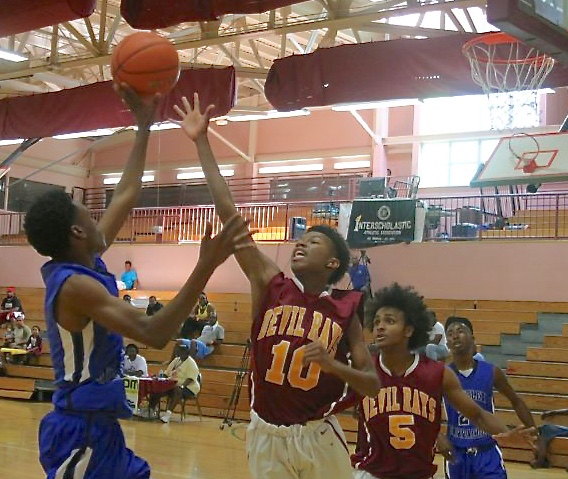 Kean&rsquo;s Jahkwani Williams defends, wearing numner 10, defends against a shot.