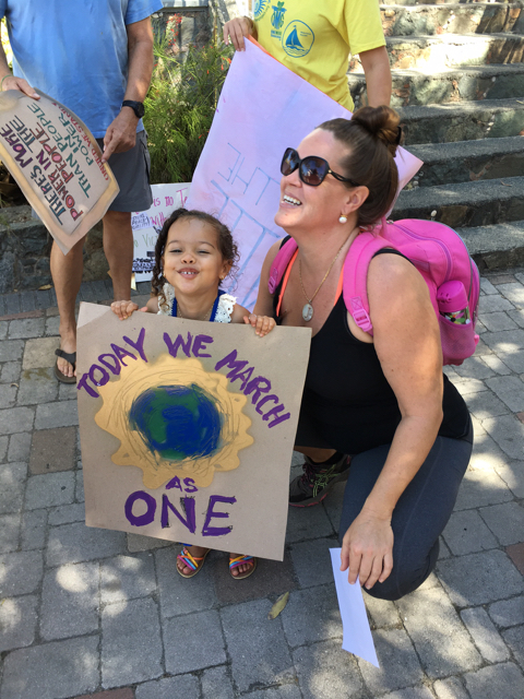 June May and her daughter, Grace, marched for 'community unity.'