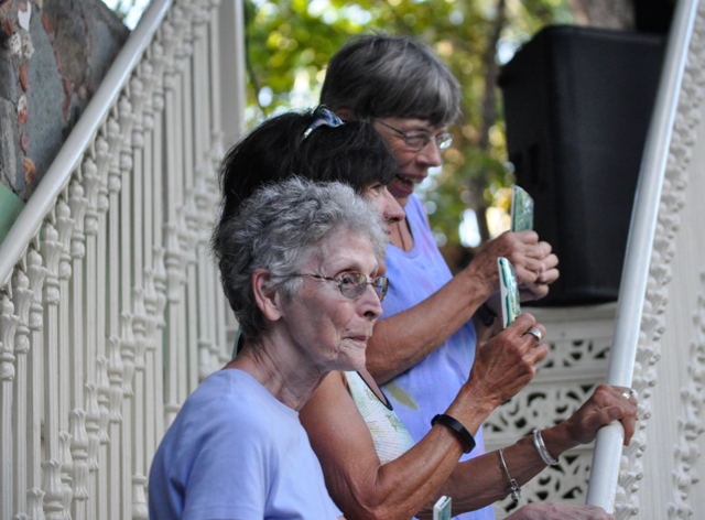 Racers in the women over 70 category Judy Messinger, Jan Peters and Christine Williamson show off their trophies after completing the 8 Tuff Miles.