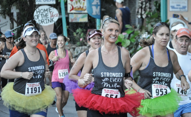 Michelle Sullivan, Tracey Gardner, and Sarah Ridgway add some color to the crowd with their racing tutus.