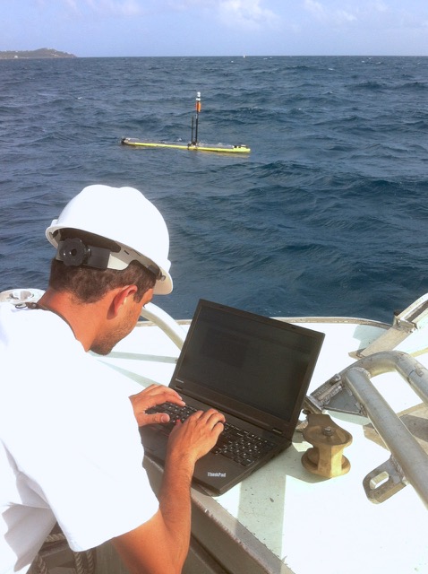 Ocean engineer Mario Miranda monitors the Wave Glider south of St. Thomas on Wednesday (photo courtesy of Rick Nemeth).