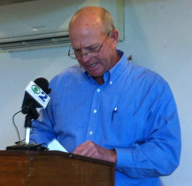 Former FBI agent Scott Wiegmann reads from his report on polygraph tests taken by members of the V.I. Republican Party.