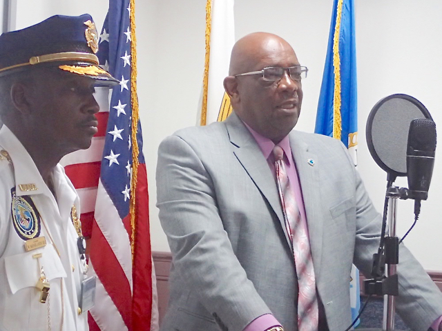 VIPD Commissioner Delroy Richards talks at Monday&rsquo;s news conference, while flanked by acting St. Croix Police Chief Winsbut McFarlande. (Susan Ellis photo)