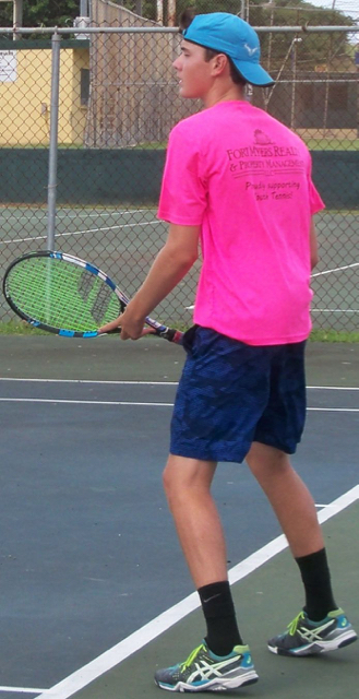 Alec Kuipers returns a serve.