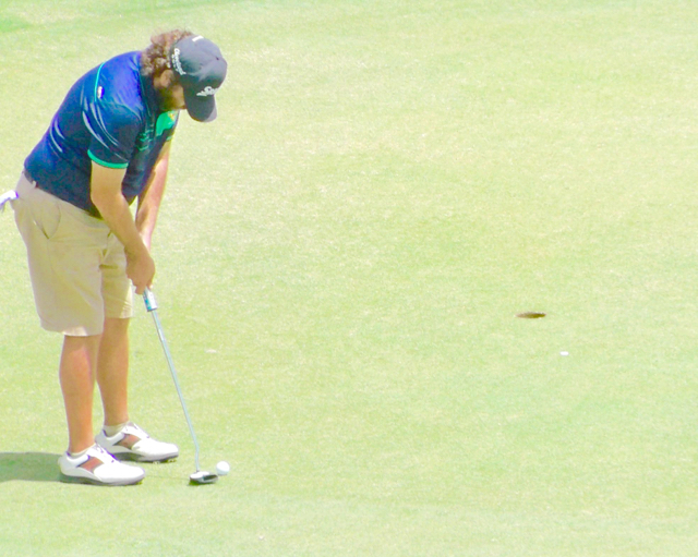 Kevin Ferris lines up a putt on the final hole. If he made, he'd have won the tournament. His missed, and took second.