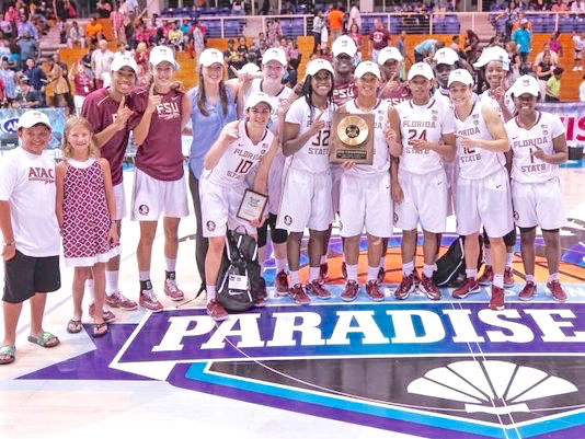 The Florida State University women's basketball team celebrates winning the Reef Division of the Paradise Jam women&rsquo;s tournament Saturday at the UVI Sports and Fitness Center. (Photo provided by Paradise Jam)