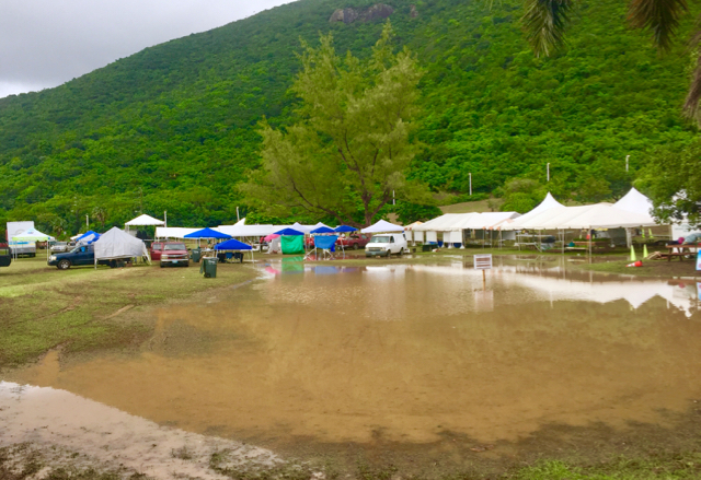 The grounds of the St. Thomas-St. John Agriculture and Food Fair were severely flooded Saturday afternoon, causing postponement of the weekend's activities.. 