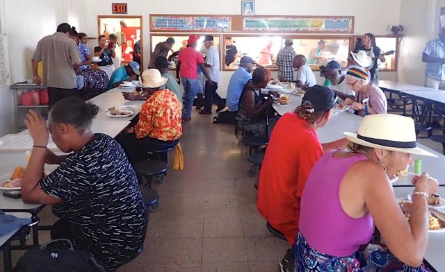 Hundreds of needy residents fill St. Mary's cafeteria on Thanksgiving.