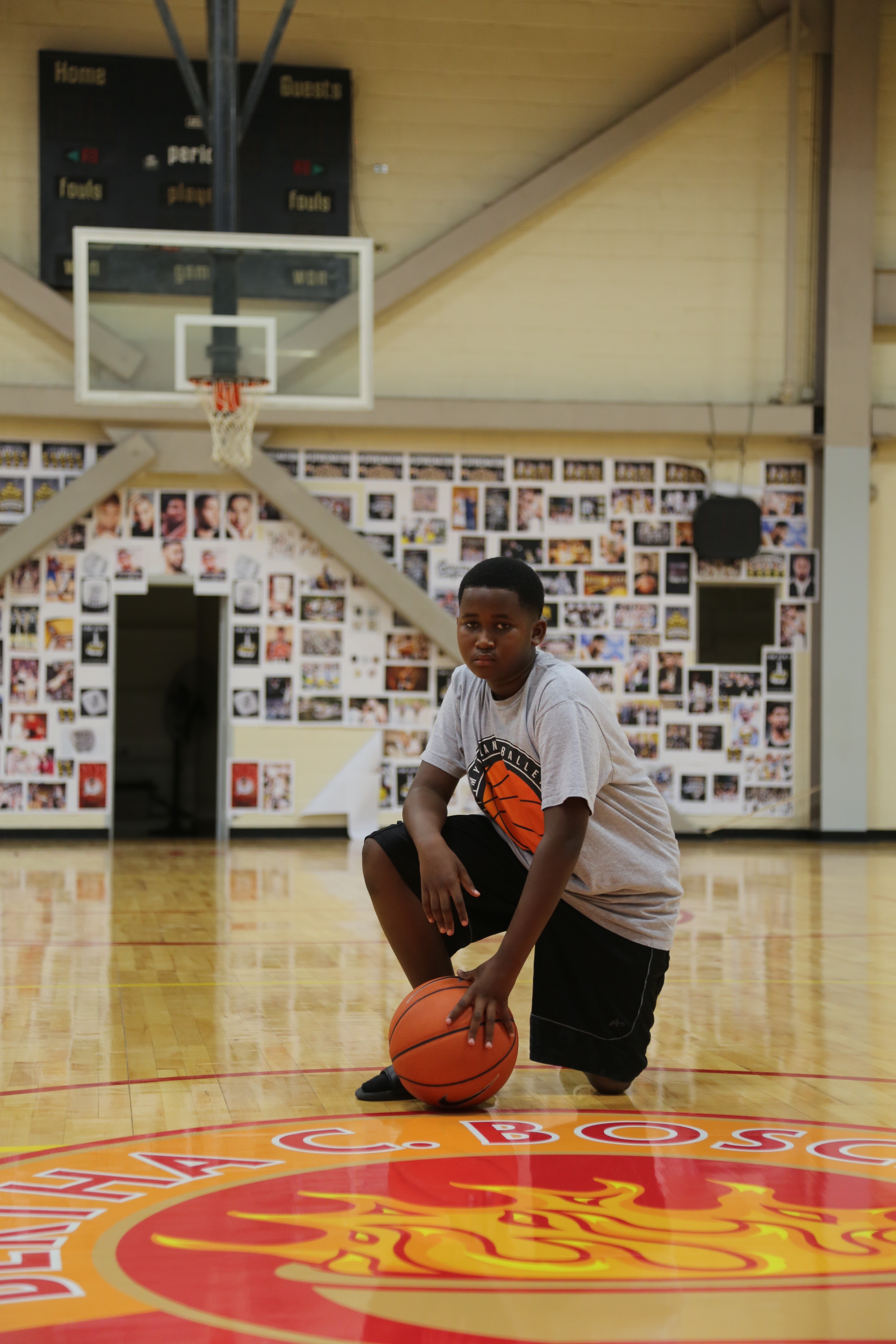 Julius E. Sprauve 6th grader Ashaun Hedrington shoots some hoops on the new hardwood basketball floors at the BCB gymnasium. 