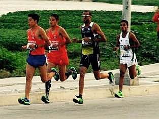 Juan Robles (white sunglasses, second from the right) competes at Media Marathon Barranquilla in Colombia