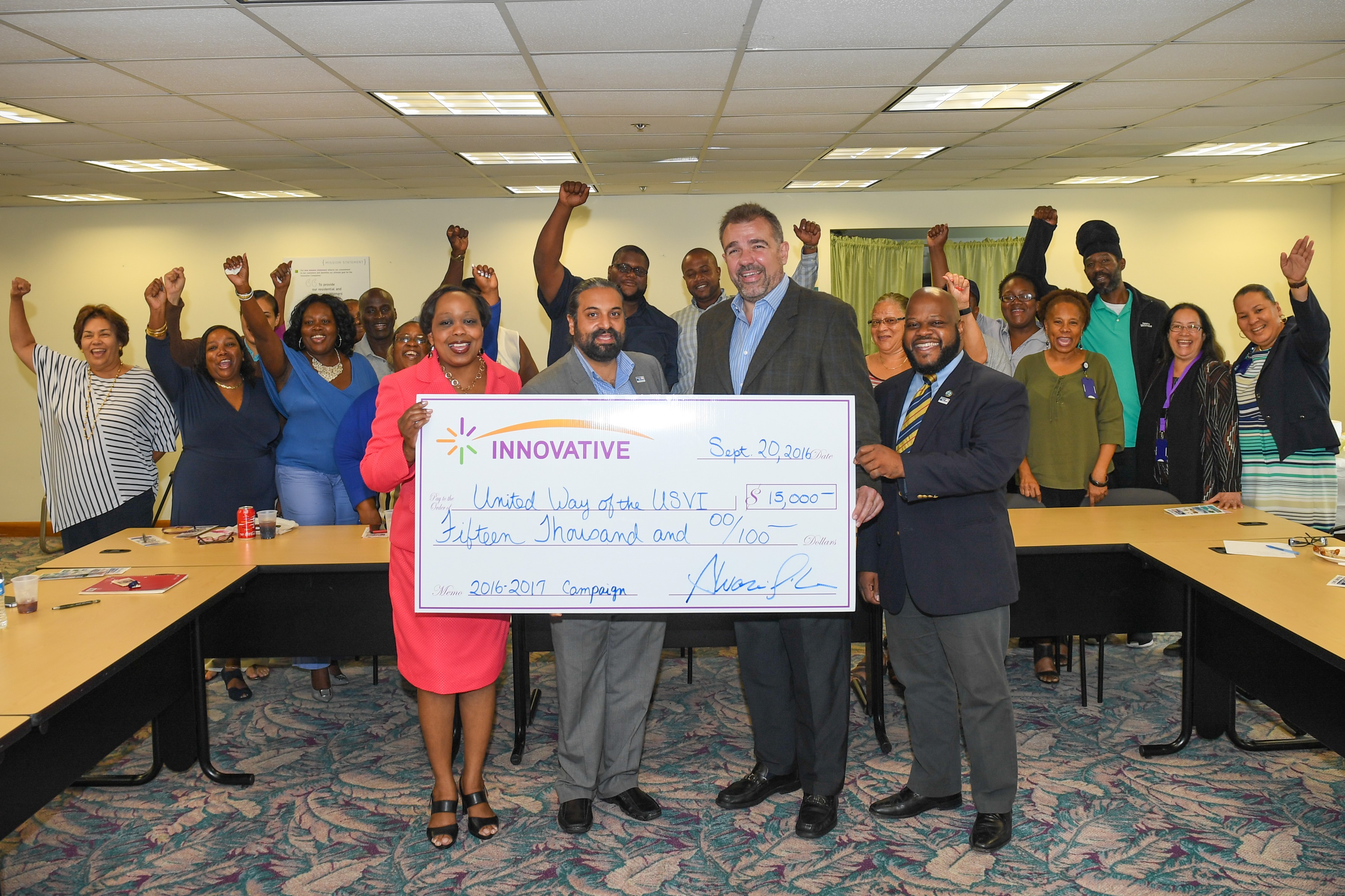 During the St. Thomas presentation, CEO Alvaro Pilar (second from the right) and Vice President of Public Relations Jennifer Matarangas-King (left) presented a $15,000 check for 2016 to United Way of the Virgin Islands CEO Vinod Dadlani (second from the left) and Board Chairman Sen. Shawn Michael Malone (right). 