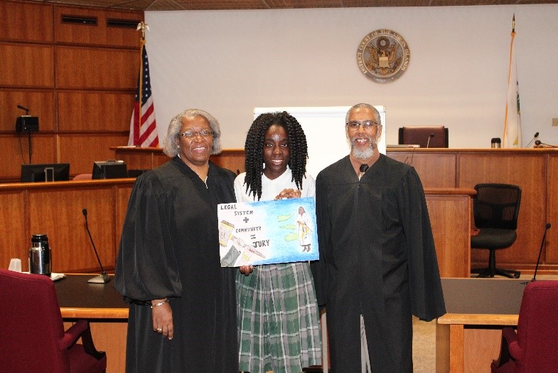 (L to R) Chief Judge Wilma A. Lewis; second-place winner in the St. Croix Division, Joi Thomas-Lewis; Magistrate Judge George W. Cannon Jr.