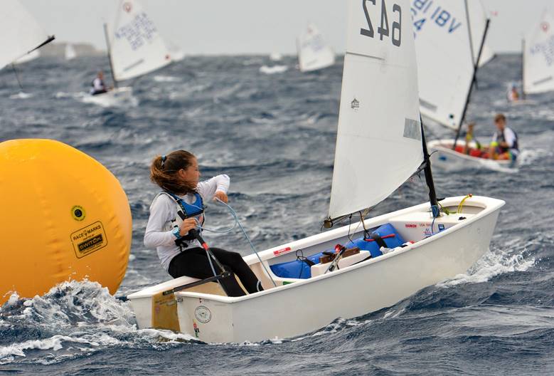 St. Thomas Yacht Club -- Mia Nicolosi, winner of the International Optimist Regatta, presented by EMS Virgin Islands, shows her racing prowess on the water. (Credit - Dean Barnes)