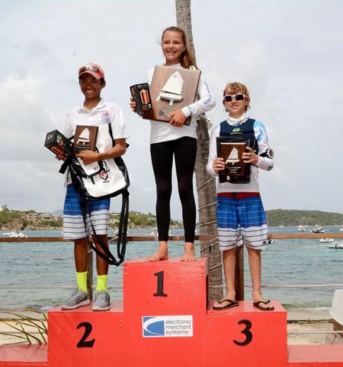 Top Three Overall Winners in the International Optimist Regatta, presented by EMS Virgin Islands, (L to R) Daven Subbiah of the USA (second), Mia Nicolosi (first) of the USVI, and Stephan Baker (third) of the USA. (Credit - Dean Barnes)