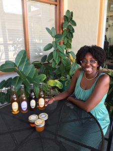Sharelle Francis displays some of her locally sourced and produced jams, jellies and liqueurs.