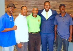 From left, Julian Jackson Jr., Susthens 'Joey' Vialet, Julian Jackson Sr., Clayton Laurent Jr., and David Rogers Sr.