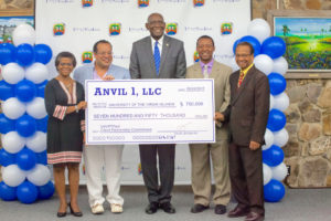 From left, RTPark Executive Director Gillian Marcelle, Dale LeFebvre of Anvil 1, UVI President David Hall, Vice President for Institutional Advancement Mitchell Neaves and James Maddirala, associate provost for Graduate, Global and Academic Affairs, pose for a photo with an oversized check showing LeFebvre's pledged eventual total contribution.