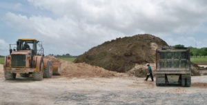 Workers prepare the ground for the UVI Medical School Simulation Center on St. Croix. (Carol Buchanan photo)