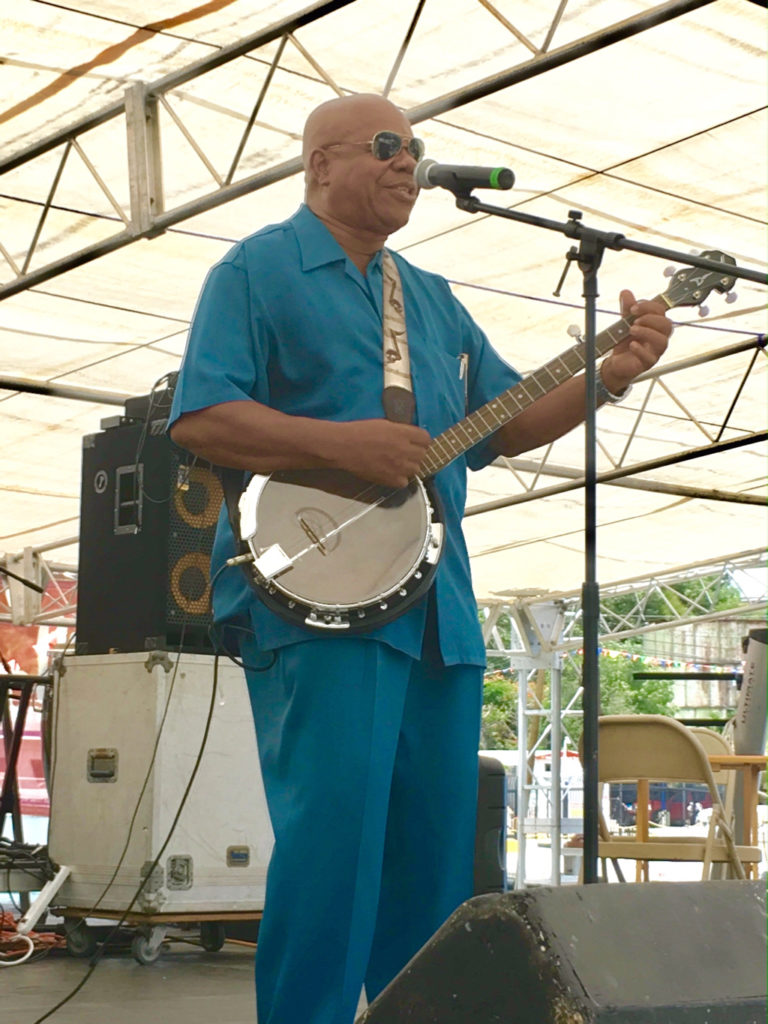 Mahlon 'Koko' Pickering helps open the program with traditional music.