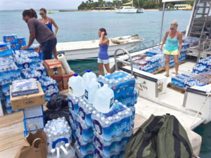 Volunteers load supplies aboard Caribbean Sea Adventures vessel Thursday for hurricane victims on St. Thomas, St. John and Water Island. (Photo by Sarah Ridgway)