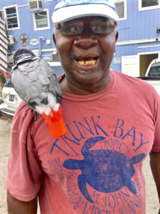 Eustace Brown brought his parrot with him on his trip to the Lumberyard for ice.