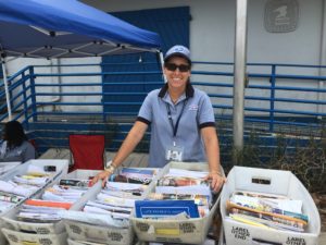 Postal worker Debbie Querrard hands out mail to St. John box holders, as a sense of normalcy slowly returns to the territory. (Amy Roberts photo)