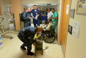 Sailors from Wasp help evacuate patients from Schneider Regional Medical Center. (Navy photo)