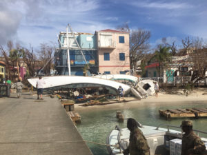 National Guard troops arrive in Cruz Bay Friday amid a scene of storm damage. (Amy Roberts photo)