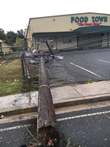 A utility pole lies in teh Food Town parking lot after being knocked over by Hurricane Irma. (Marina Ricci photo)