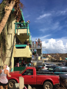 People flock to the Boulon Center in Cruz Bay to use the wireless hot spot, one of the few on St. John. (Amy Roberts photo)