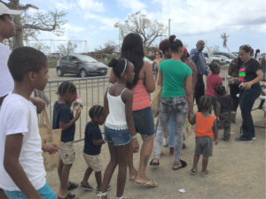 People line up in Frederiksted's Midre Cummings Park for supplies from Tim Duncan's 21 USVI Hurricane Help on Sunday. (Ivy Hunter photo)