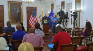 U.S. Surgeon General Dr. Jerome Adams addresses the media Thursday at Government House on St. Croix. (Jamie Leonard photo)