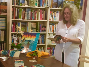 Apple Gidley reads her novel, 'Fireburn,' at the River Oaks Bookstore in Houston. (Photo by Andrea Bonner)