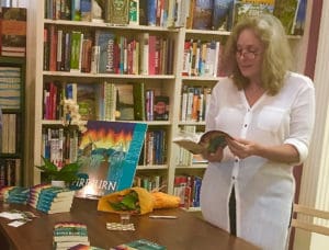 Apple Gidley reads her novel, 'Fireburn,' at the River Oaks Bookstore in Houston. (Photo by Andrea Bonner)