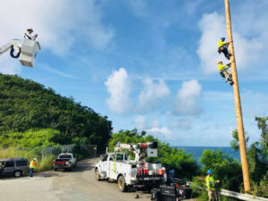 The USVI Hurricane Heroes calendar features first responders and lineman who came to the territory's aid. (Photo by Rebecca Howe)