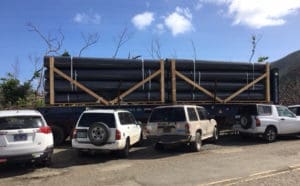 A stack of composite poles lies ready to go up on St. John.