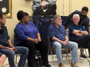 Seated from left, Jeff Quinlin from the Kenny Chesney Foundation, Commissioner of Education Sharon McCollum, Tom Secunda of Bloomberg Philanthropies and former President Bill Clinton discuss long-term recovery for the islands.