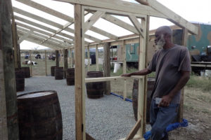 Dale Browne of Sejah Farms shows of his new nursery/greenhouse being built with the help of volunteers. (Susan Ellis photo)