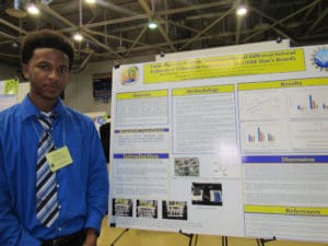 UVI undergrad Hairol Breton with his presentation studied the phenolic content of Old Man’s Beard.