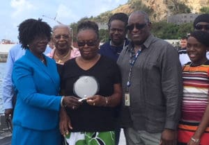 The crowd attending the christening included, front row from left, VIPA Governing Board Chairwoman Laurel Hewitt-Sewer, Ena Freeman, widow of the late George Elwin Freeman, Sr., and VIPA Executive Director David W. Mapp.