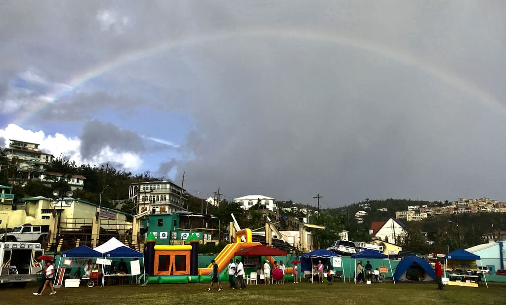 A rainbow brightens the clouds over the March 24 Light Up the Night fundraiser for the St. John Cancer Fund. (Photo by Krista Kramer)