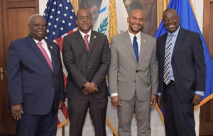 From left, Gov. Kenneth Mapp, Budget Director Julio Rhymer, Public Works Commissioner Nelson Petty Jr. and Lt. Gov. Osbert Potter pose after Tuesday's swearing-in ceremony. (Government House photo)