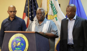 From left, Public Works Commissioner Nelson Petty, Gov. Kenneth Mapp and Lt. Gov. Osbert Potter outline plans for a major overhaul of the territory’s road system.
