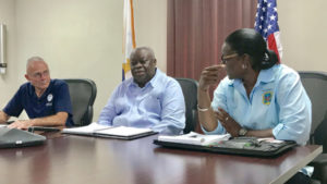 From left, FEMA Region II Coordinating Officer Bill Vogel, Gov. Kenneth Mapp and VITEMA Director Mona Barnes take part in Wednesday's video teleconference with D.C. officials. (Government House photo)
