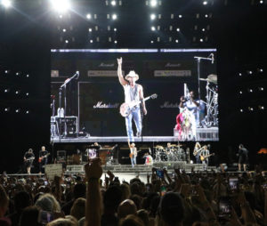 Kenny Chesney takes the stage at Philadelphia’s Lincoln Financial Field, backed by a giant television screen. The audience of more than 60,000 included an enthusiastic party from St. John. (Photo by William Stelzer)