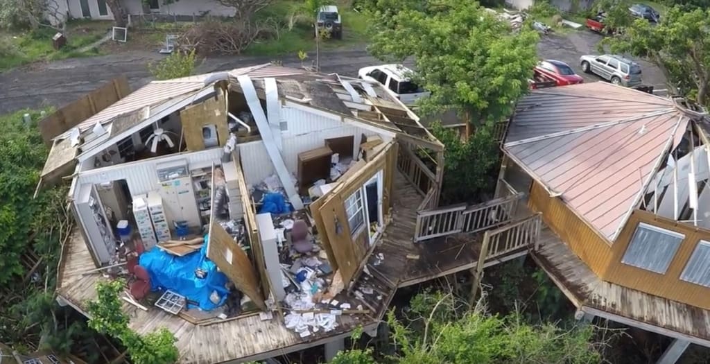 VINP offices damaged at Lind Point in Hurricanes Irma and Maria. (NPS photo)